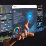 Data analyst working on business analytics CDP dashboard with charts, with KPI and metrics connected to the database for technology finance, operations, sales, marketing